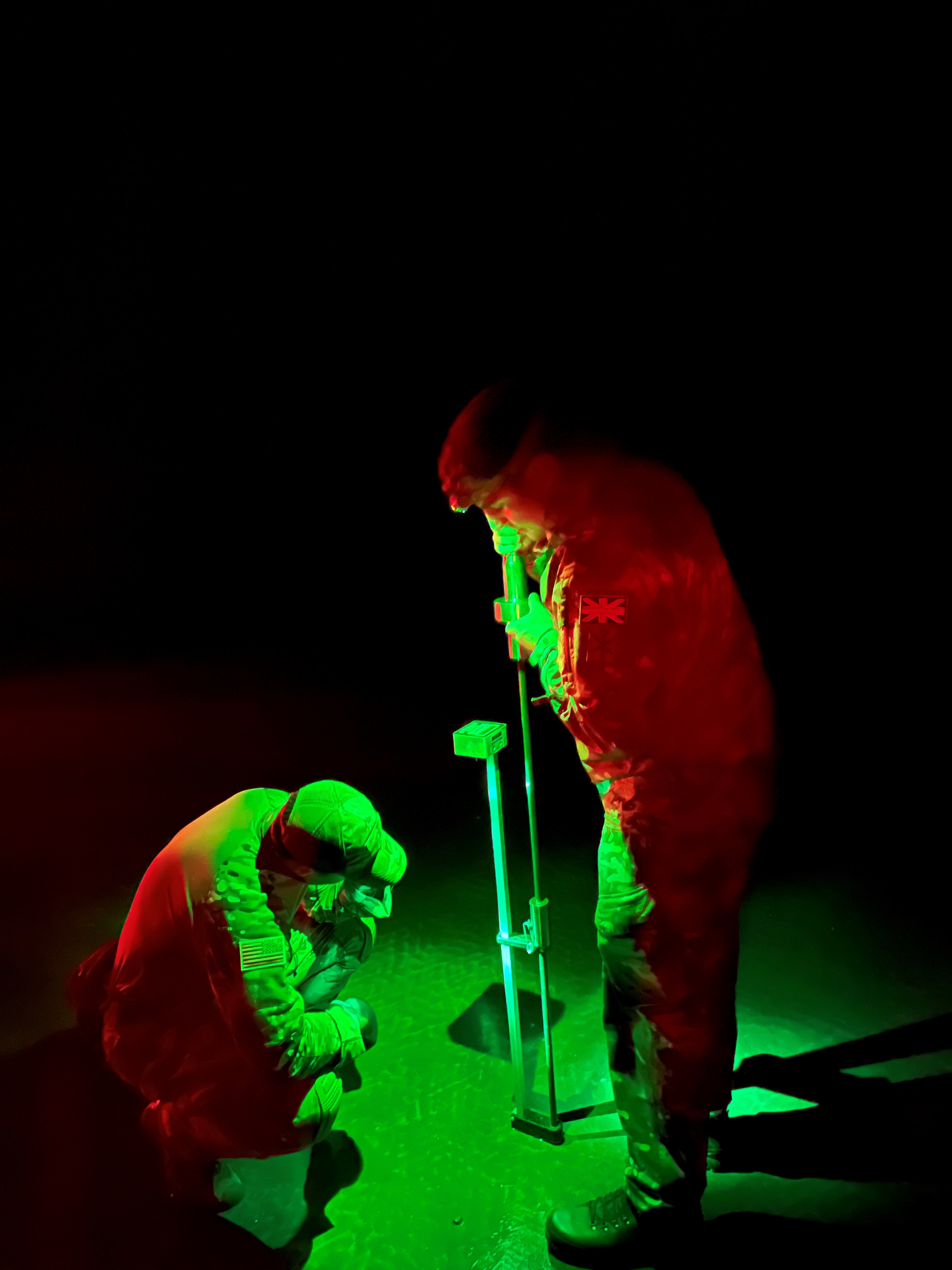 Photo - UK and US personal testing the sand prior to night beach landing training at Pembrey Sands